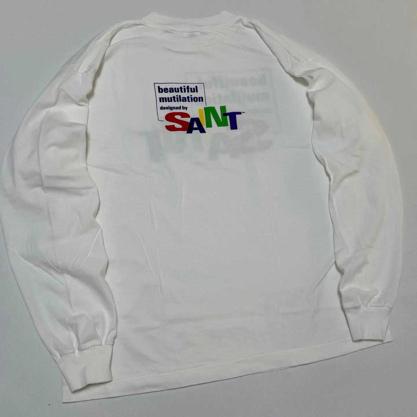 SAINT Mxxxxxx LS TEE/BEAUTIFUL SAINT/WHT Colorful SAINT slogan long-sleeved TEE White S-XL Cylindrical side seamless fabric Really made with care! Domestic printing factory OEM, original water slurry non-touch printing process, correct version, correct main mark/wash mark/little angel anti-counterfeiting mark